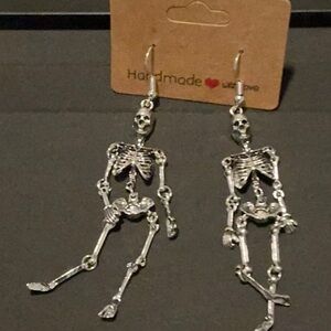 Halloween skeleton earrings.
